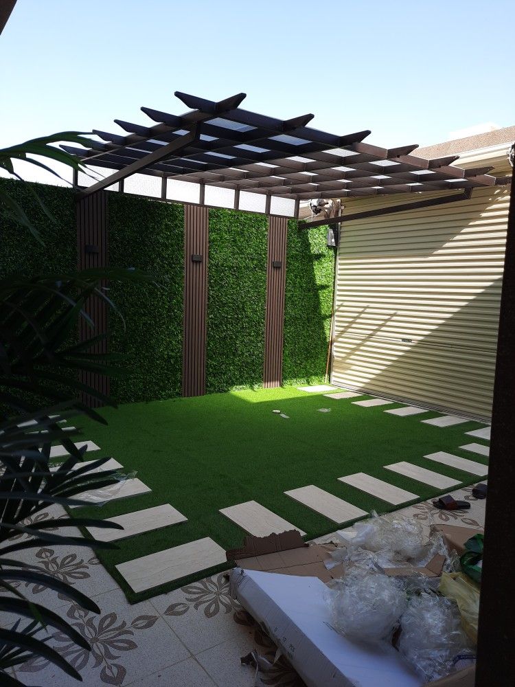 تنسيق حدائق عشب جداري ثيل طبيعي صناعي مظلة شلال جلسه تكسيات بديل