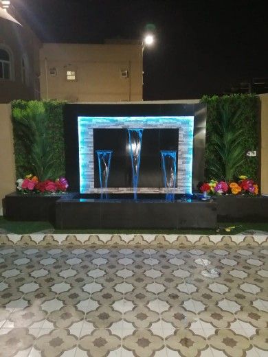 تنسيق حدائق شلالات عشب صناعي جلسات مرتفعه ثيل طبيع