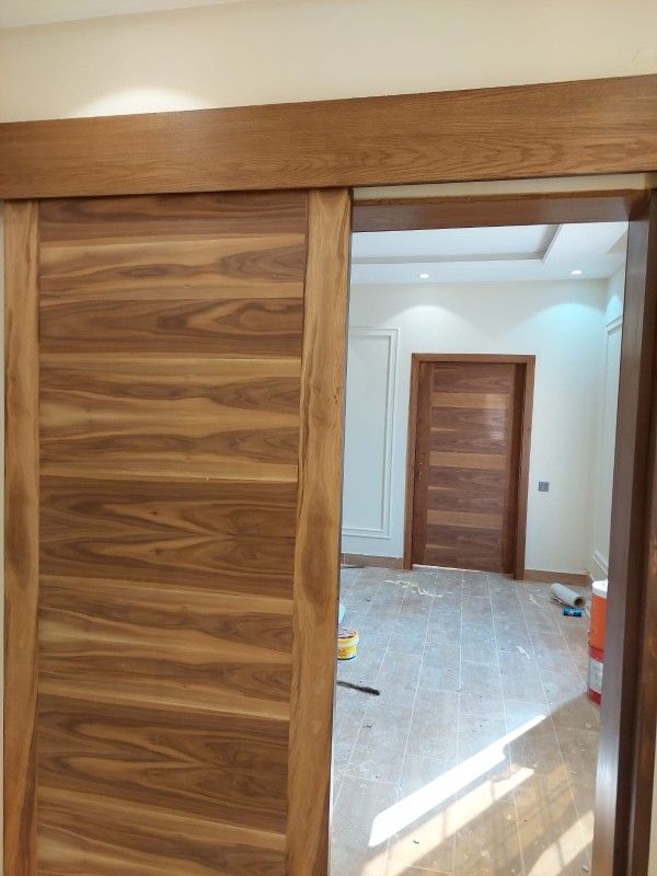 دهان جميع انواع الخشب ابواب وغرف وديكور ودهان حديد