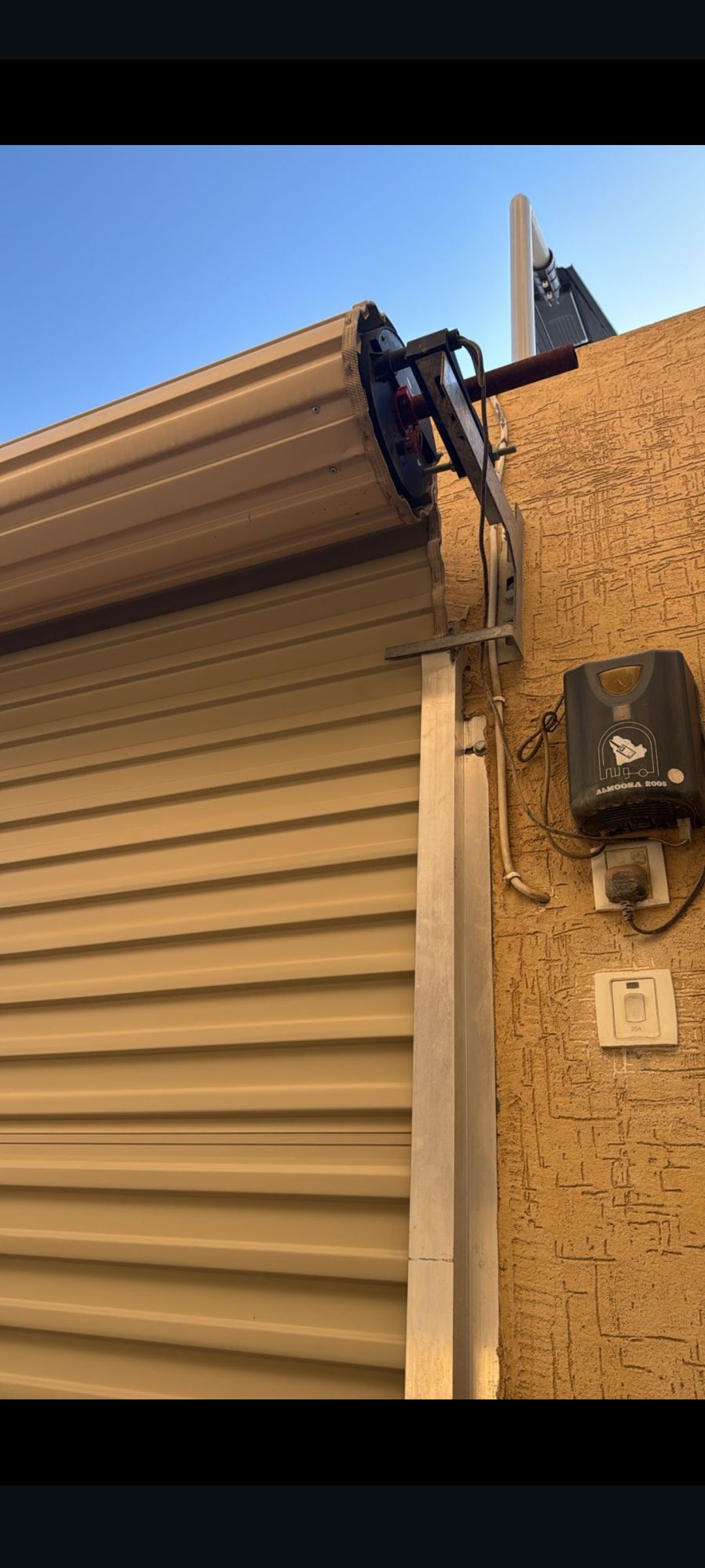 توريد وتركيب وصيانة ابواب الكراج الأتوماتيكيه ونوا