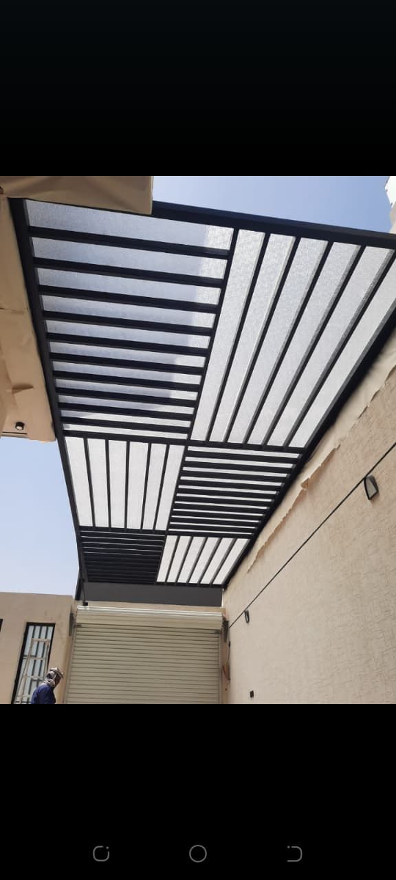 ساندوش بانل وترميم ومظلات وسواتر وبرجولات