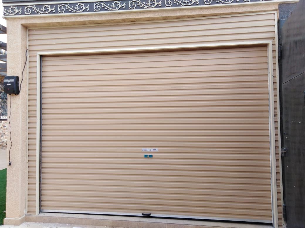 صيانه وتوريد وتركيب ابواب الكراج ونوافذ الشتر الكه