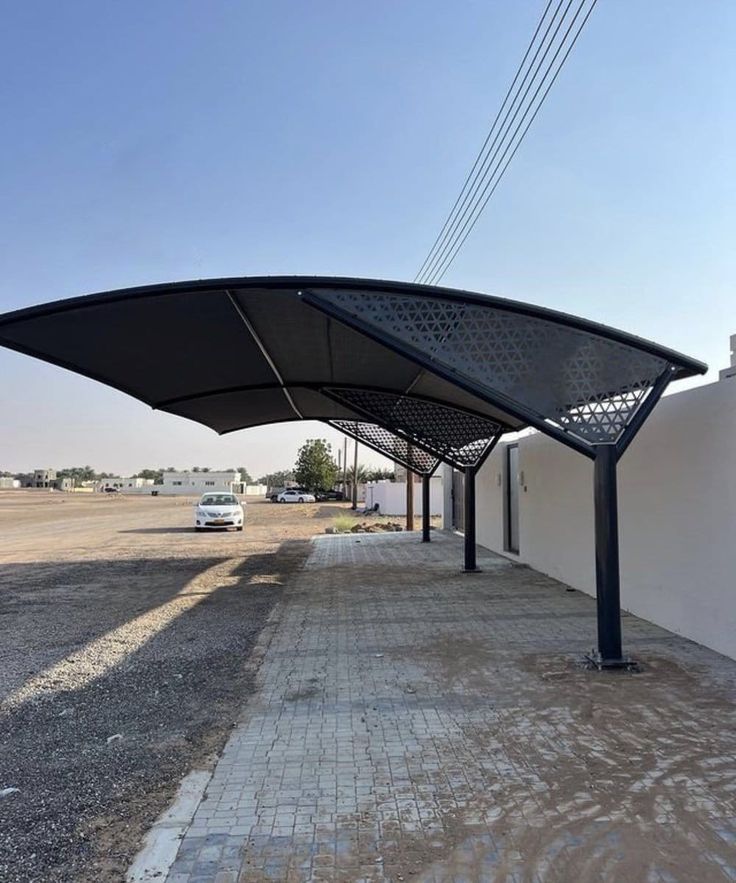 مظلات سيارات حديد وقماش PVC